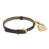 Pulsera cuero cartier con adorno de bolso en oro amarillo