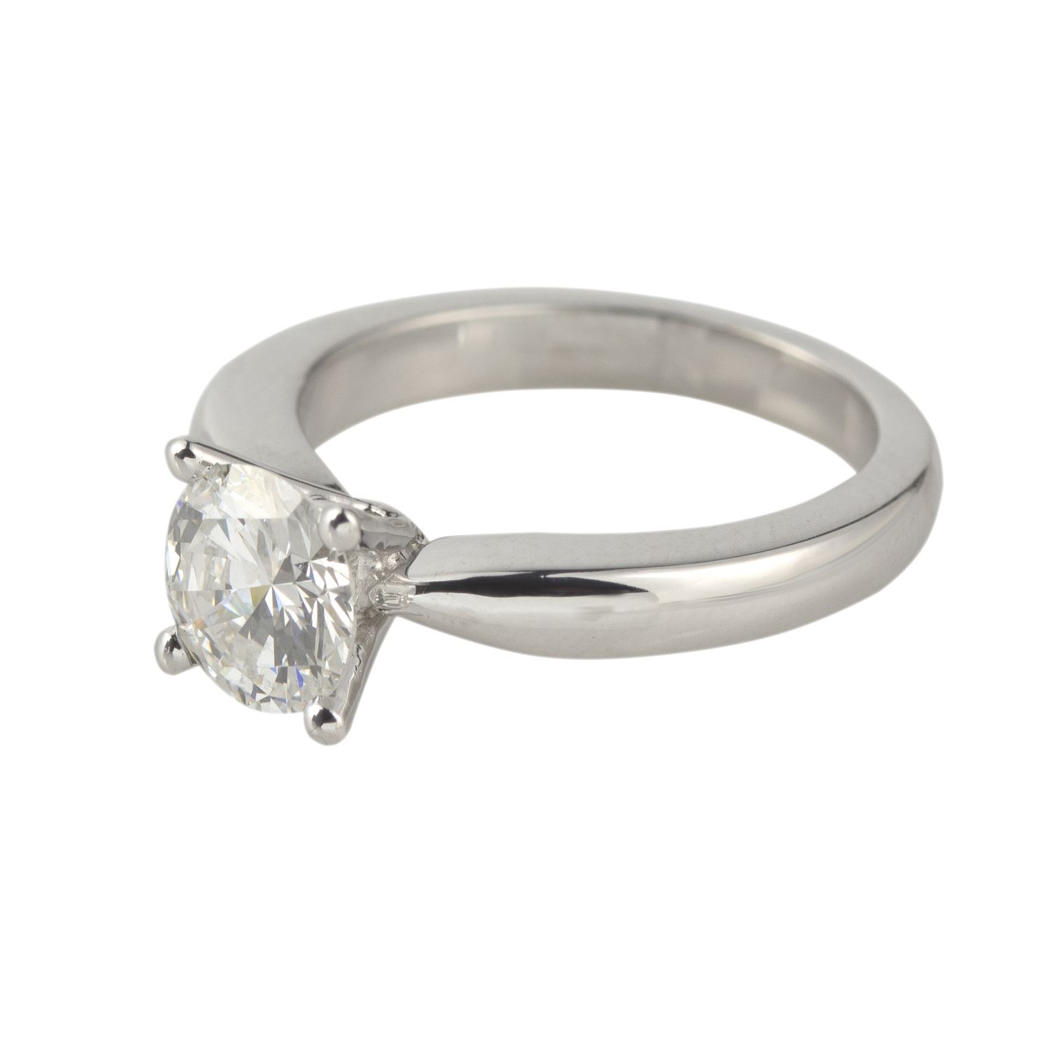 Solitario oro blanco color f, pureza vs1 y peso 1,23 cts.