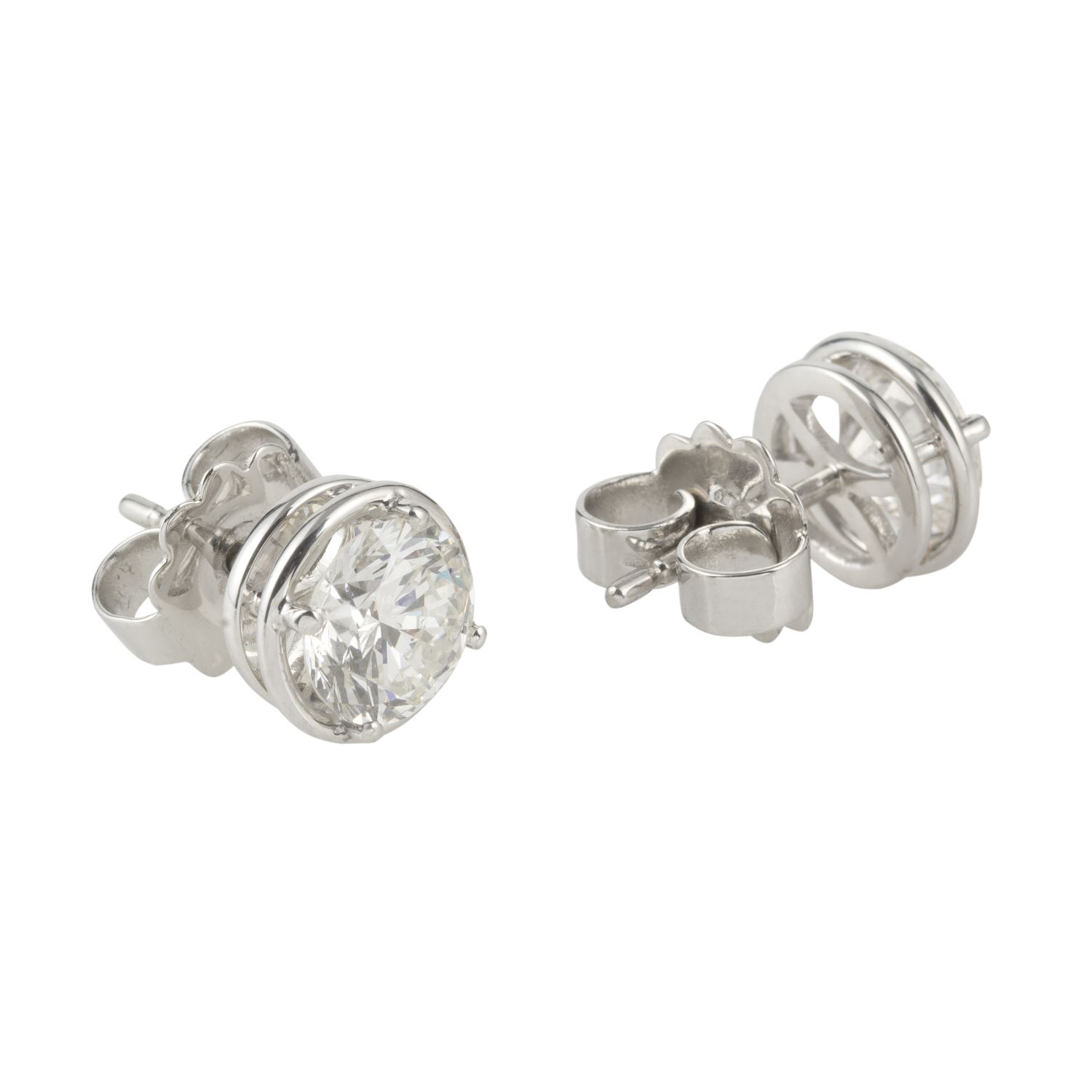 Pendientes dormilonas oro blanco color g, pureza si y peso 3,02 cts.