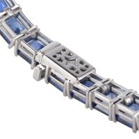 Pulsera riviere oro blanco y zafiros.