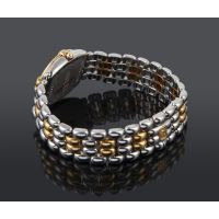 Gstaad acero y oro brillantes señora.   