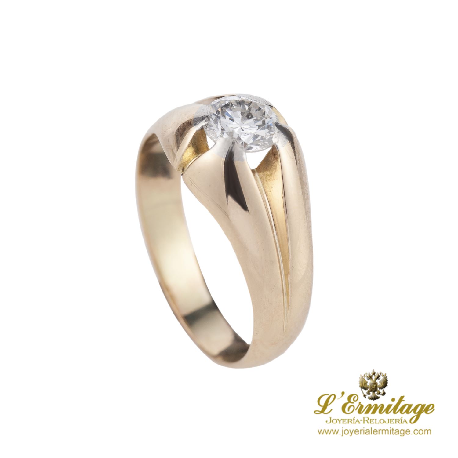 Solitario en oro amarillo y un brillante.