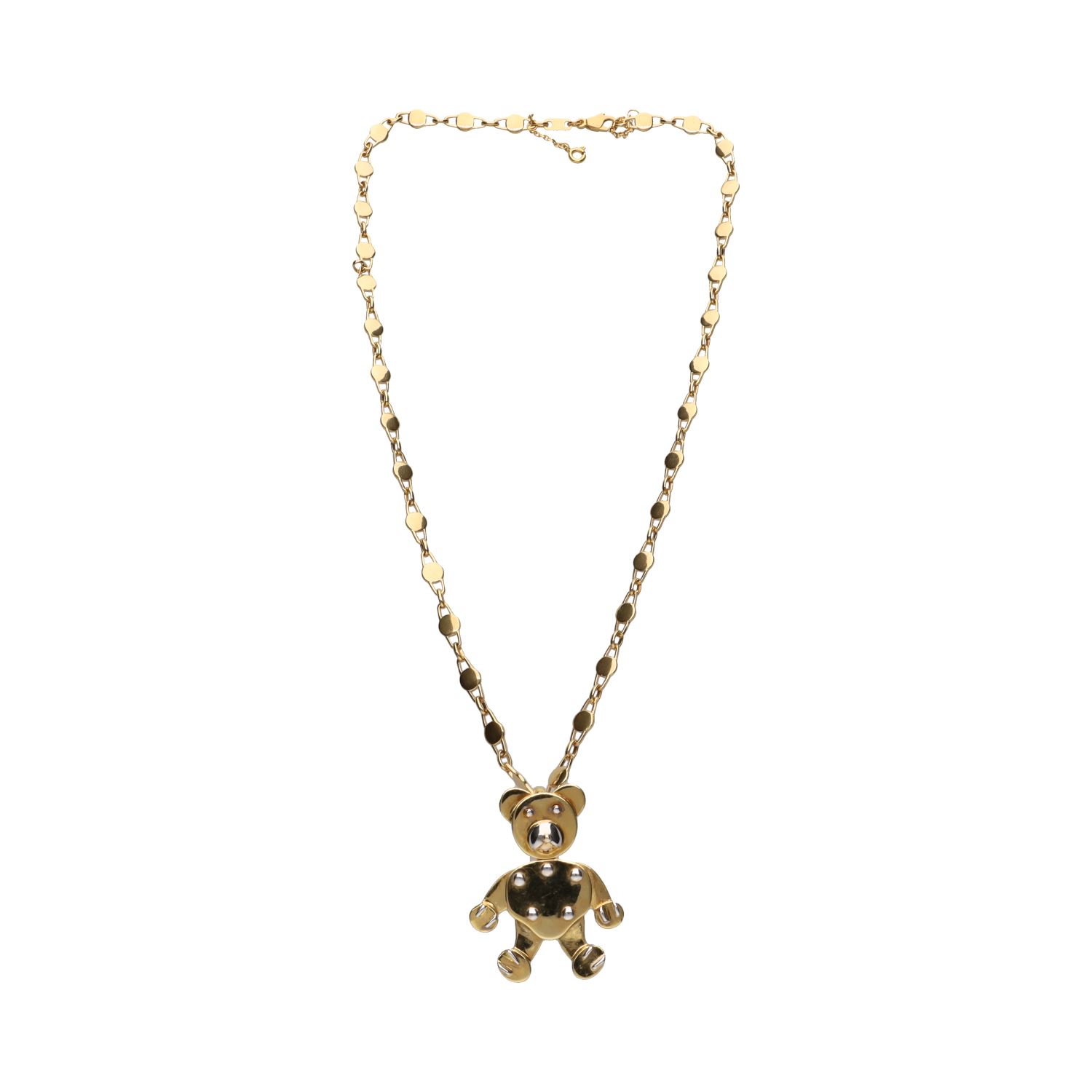 Collar en oro amarillo y oro blanco con colgante en forma de osito.