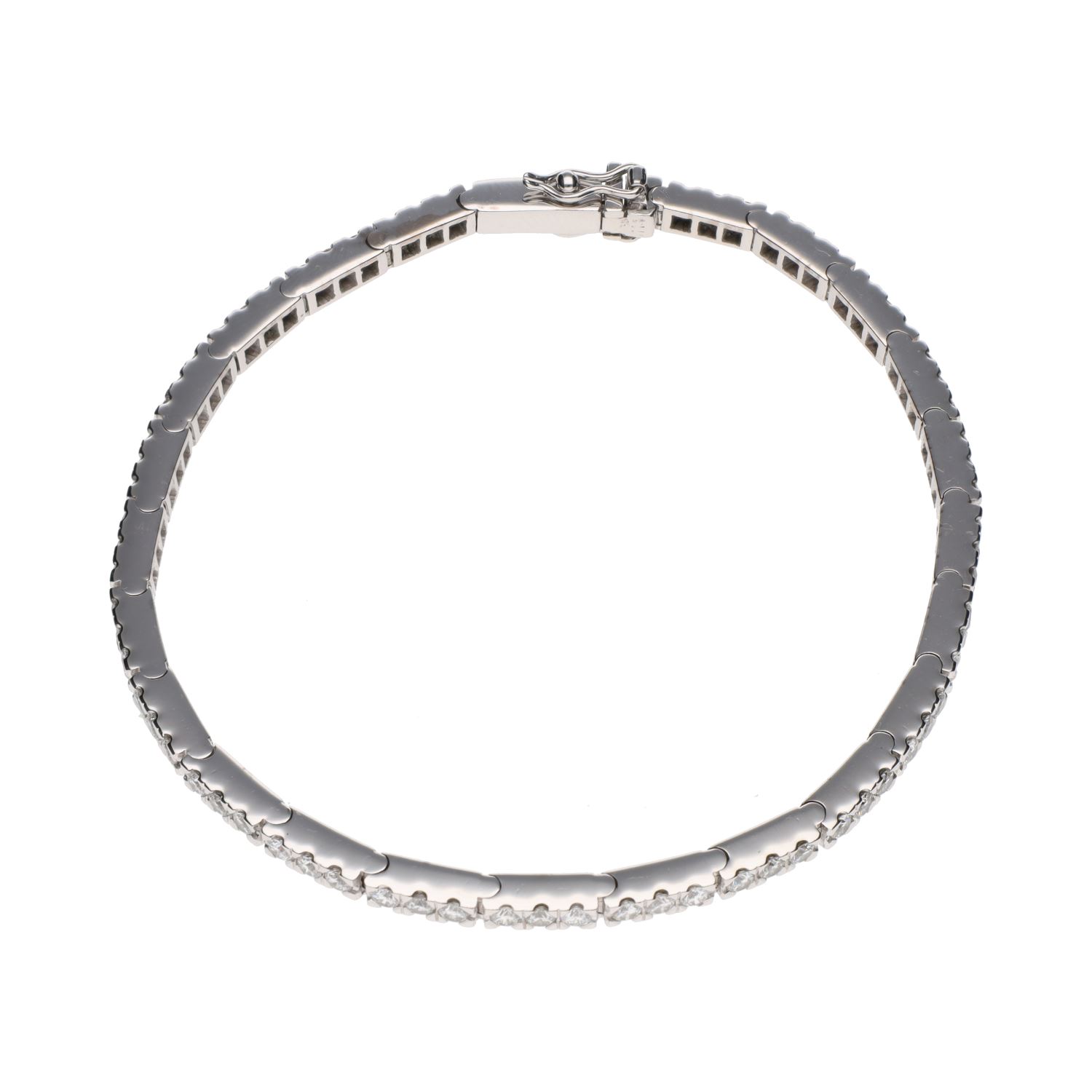 Pulsera riviere en oro blanco y brillantes.