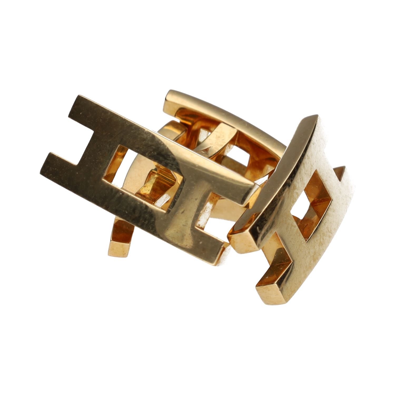 Gemelos hermés doble h en oro amarillo.