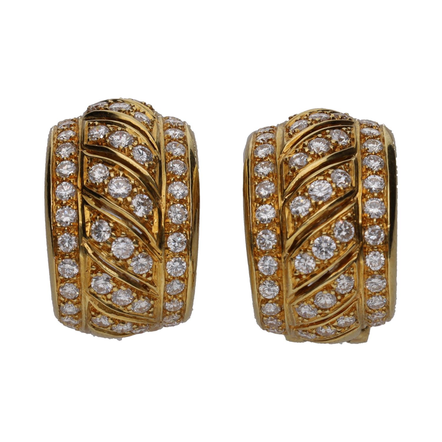 Pendientes en oro amarillo y brillantes.