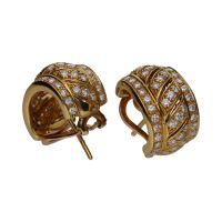 Pendientes en oro amarillo y brillantes.