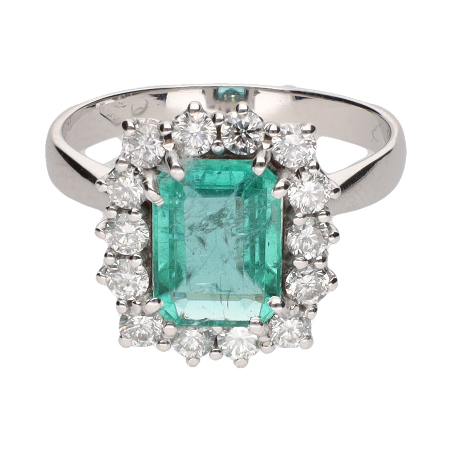 Sortija en oro blanco con esmeralda y brillantes.