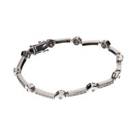 Pulsera en oro blanco con brillantes.