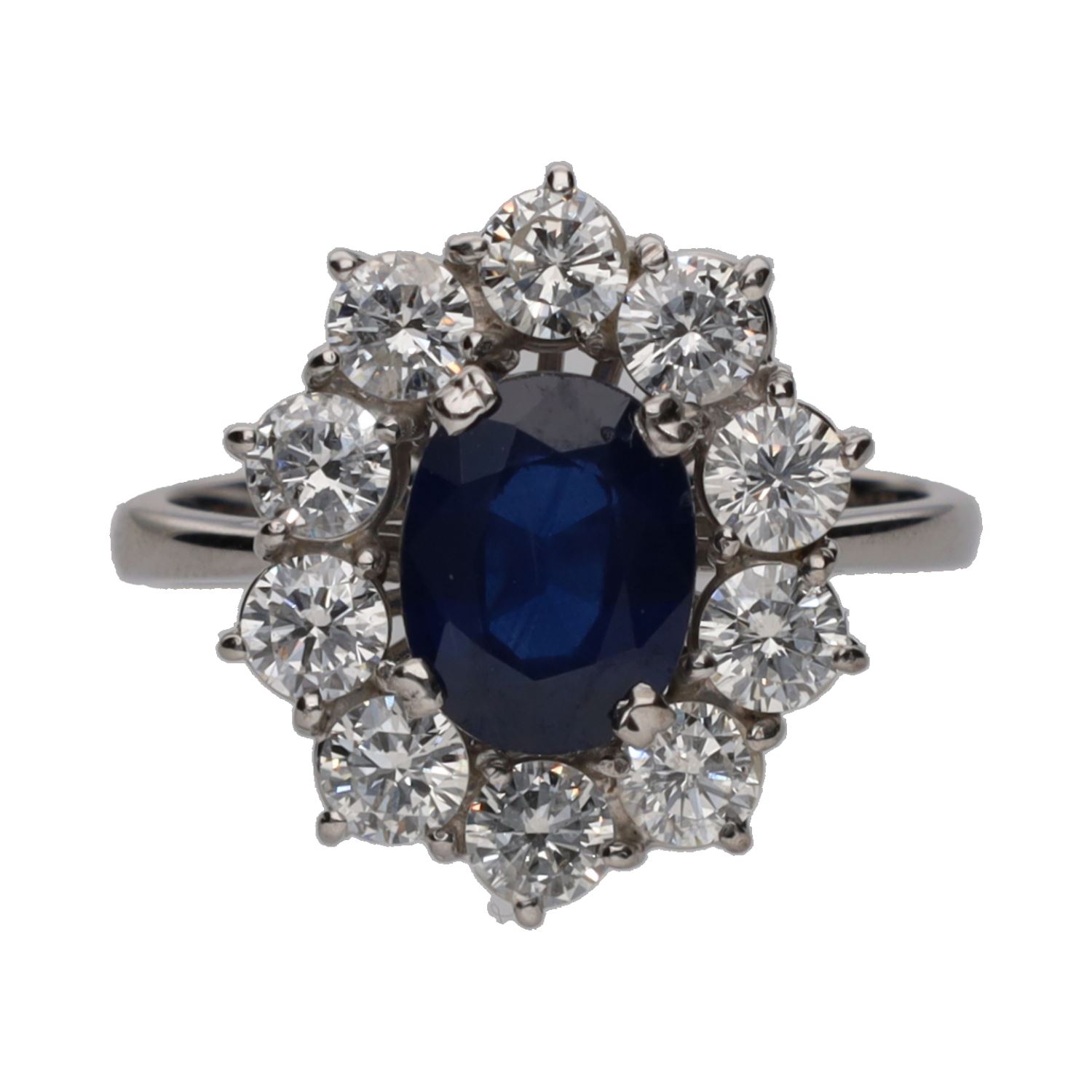 Sortija en oro blanco con zafiro y brillantes. Talla 19.