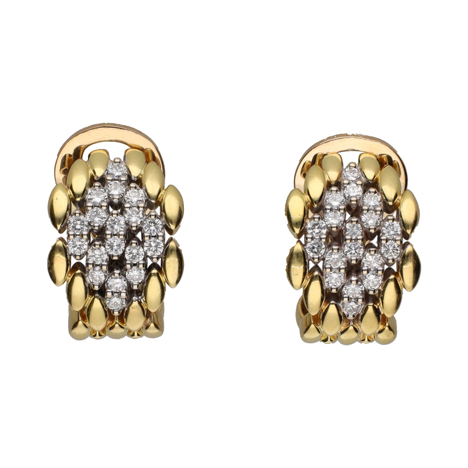 Pendientes en oro amarillo y brillantes.