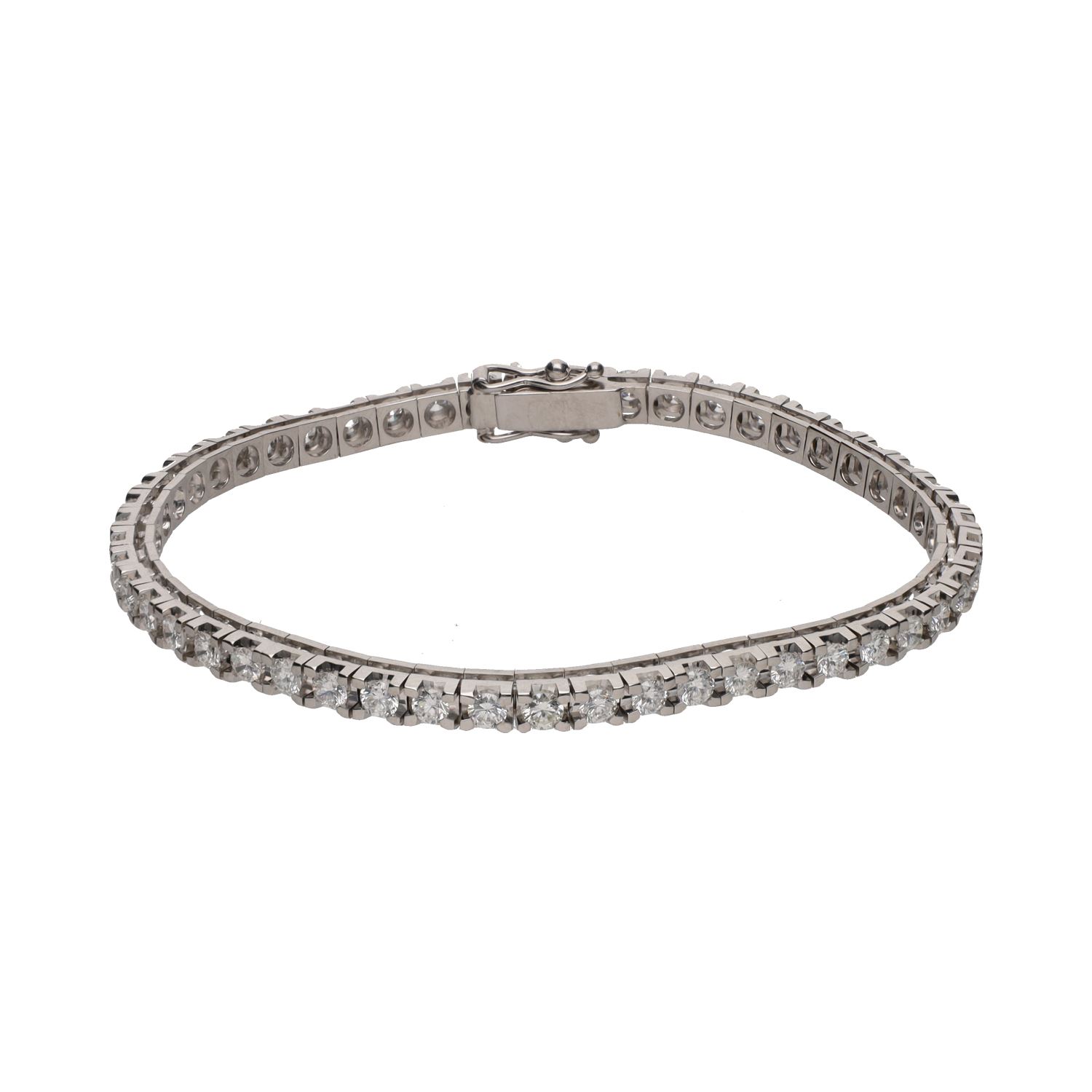 Pulsera riviere en oro blanco con brillantes.