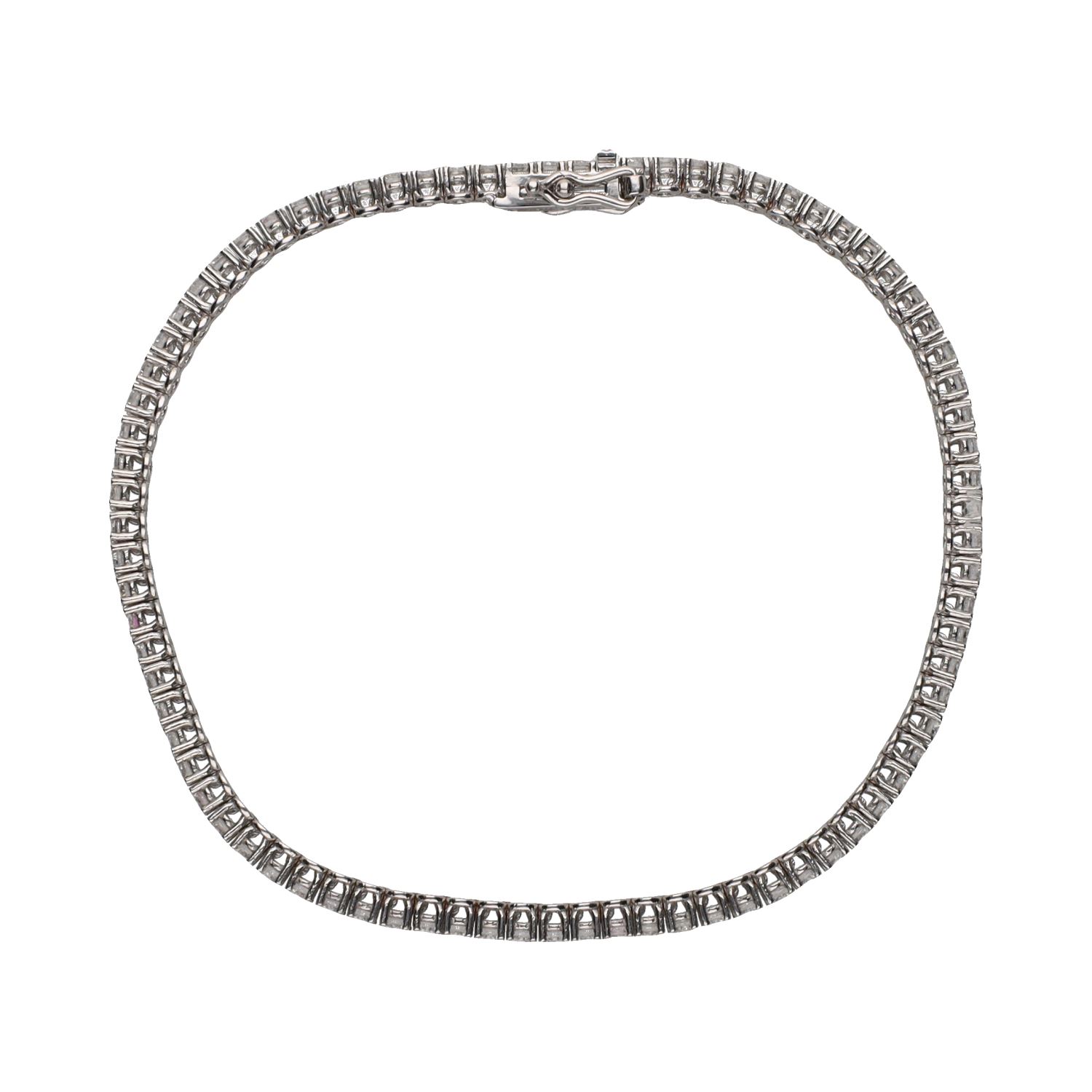 Pulsera riviere en oro blanco con brillantes.