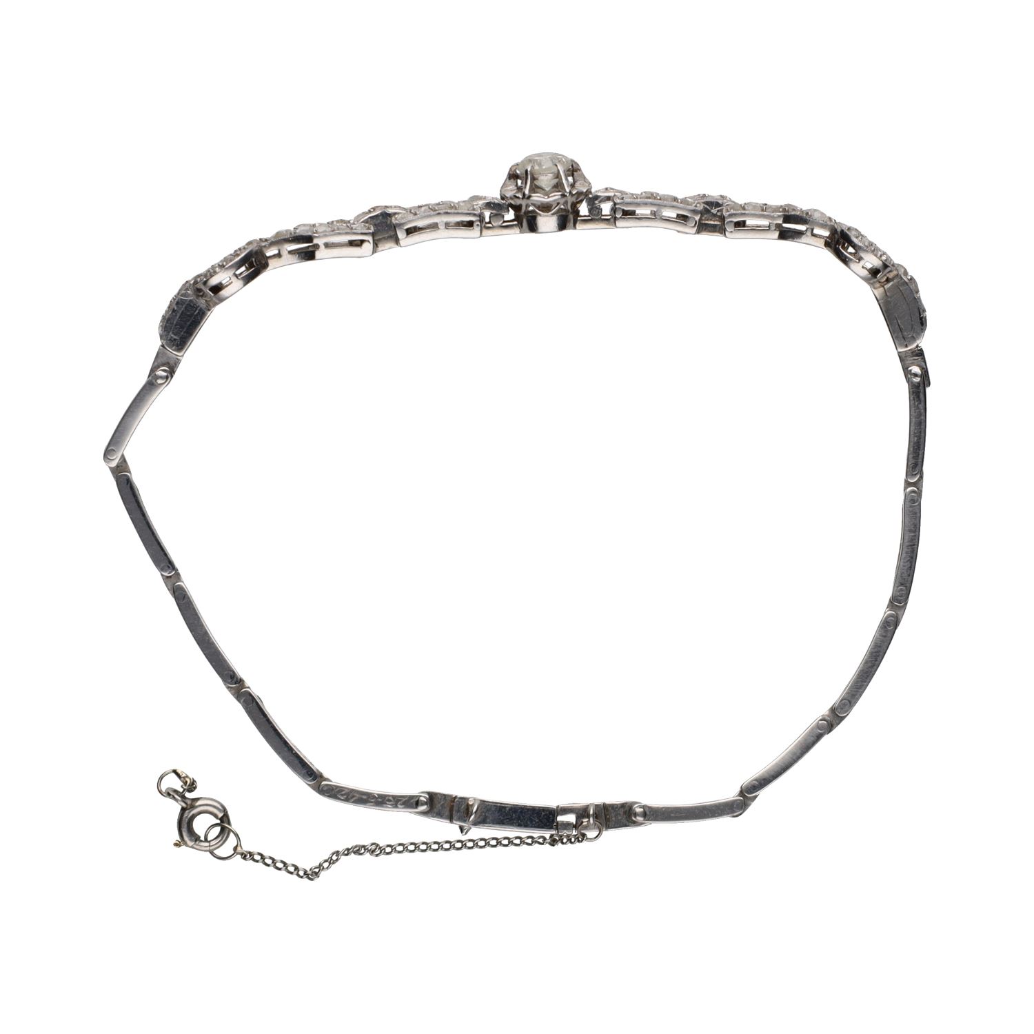 Pulsera antigua en oro blanco con diamantes.