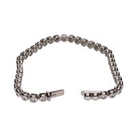 Pulsera riviere en oro blanco con brillantes en chatón.