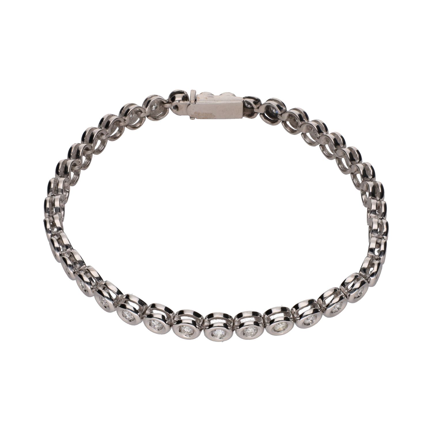 Pulsera riviere en oro blanco con brillantes en chatón.