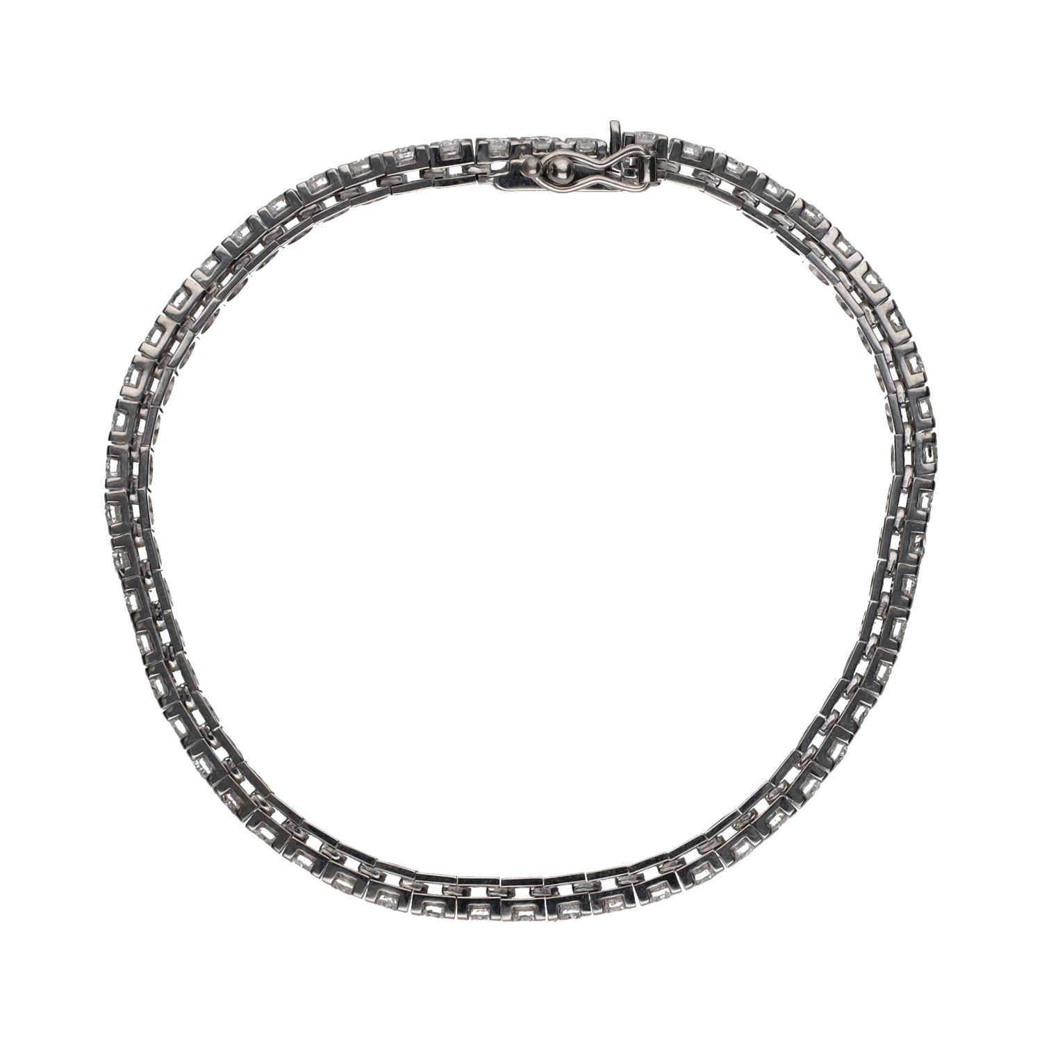 Pulsera riviere en oro blanco con brillantes.