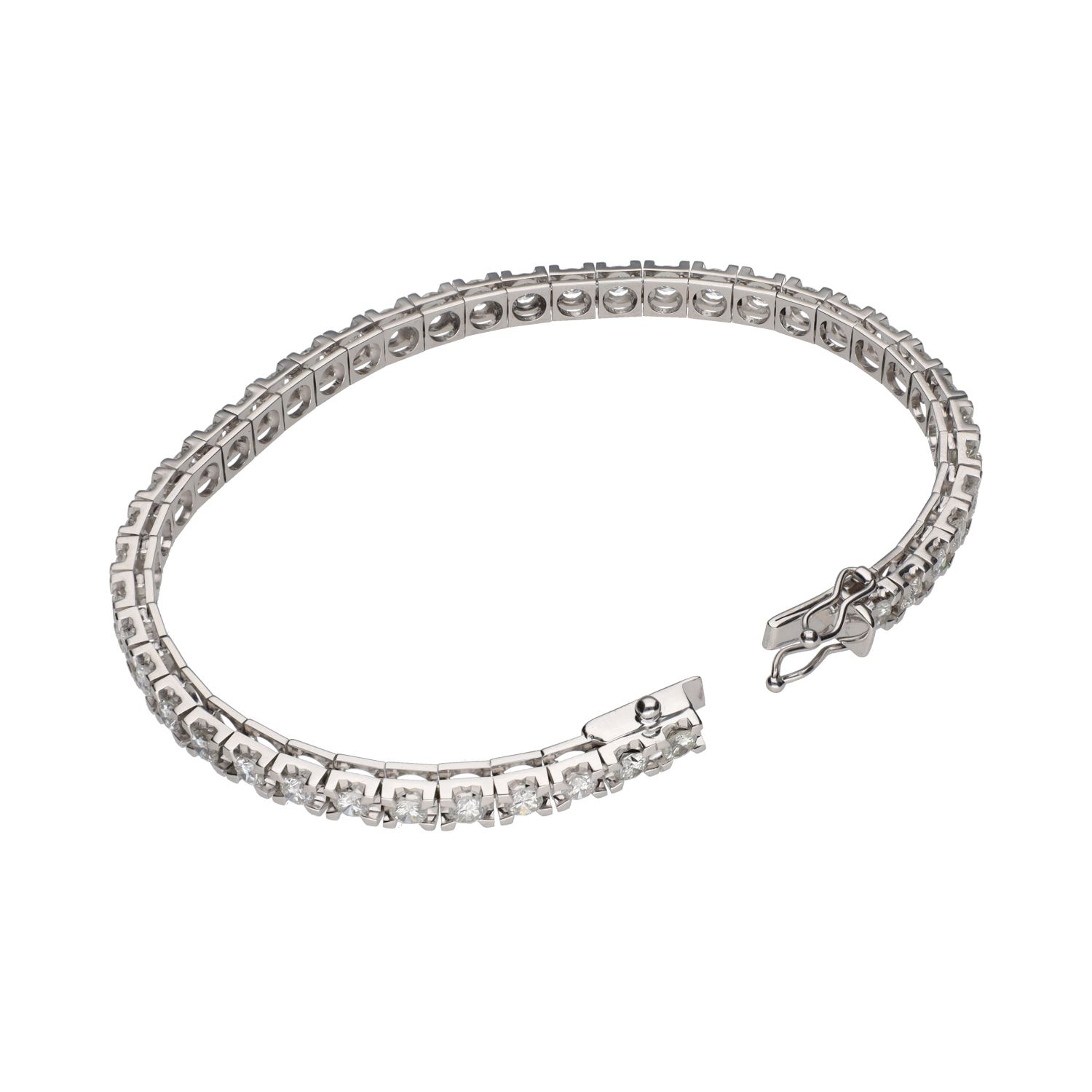 Pulsera riviere en oro blanco con brillantes.