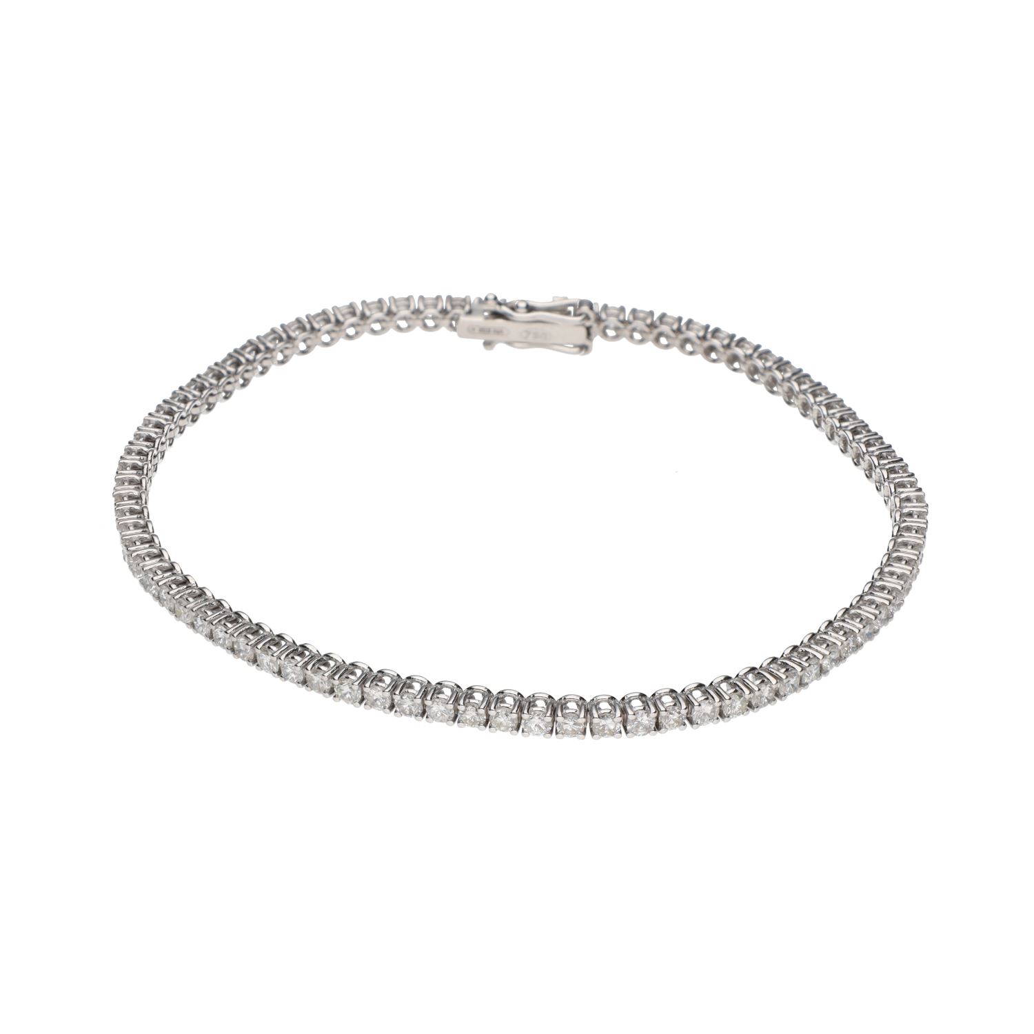 Pulsera riviere en oro blanco con brillantes.