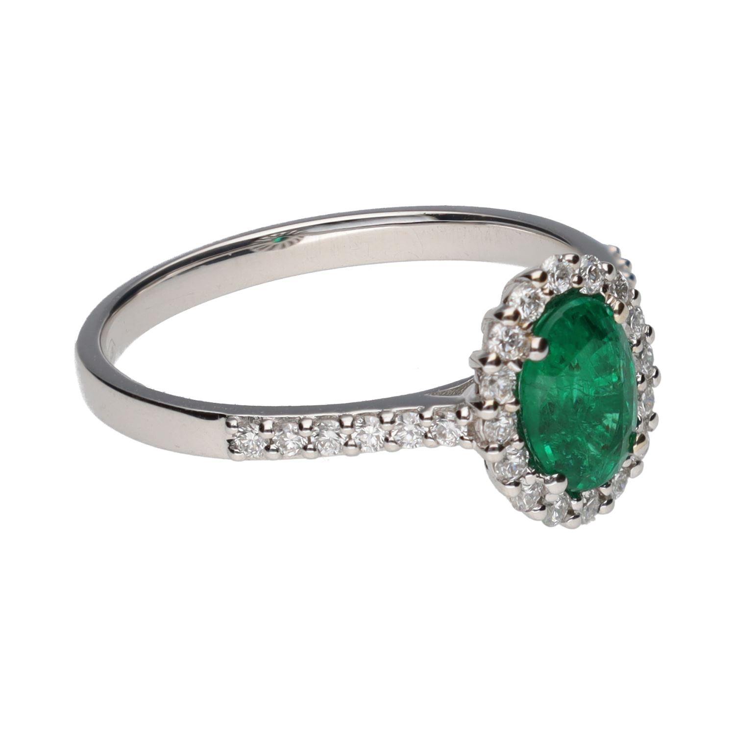 Sortija en oro blanco con esmeralda central y brillantes en orla y brazos. Talla 15.