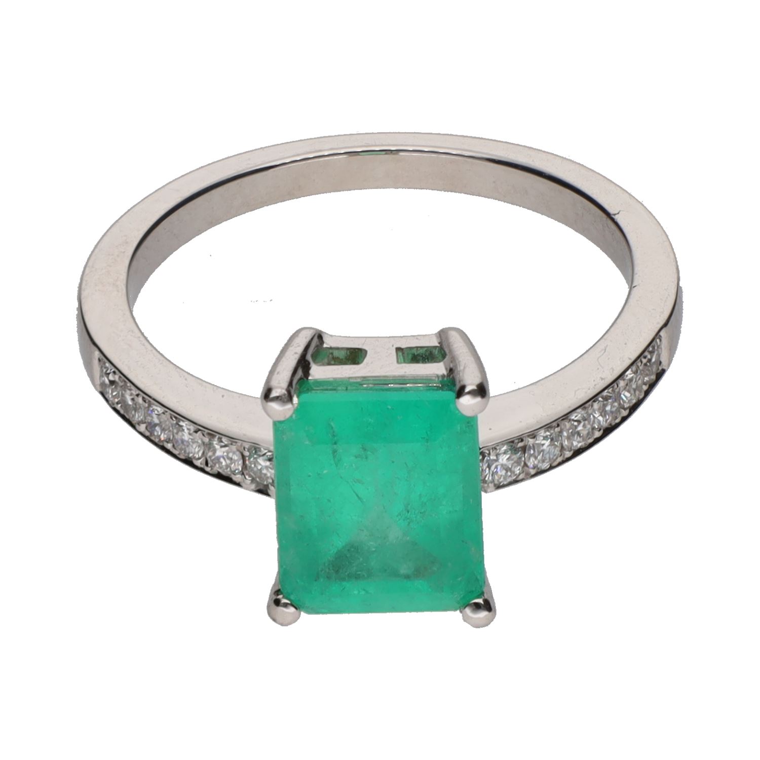 Sortija con esmeralda central y brillantes en brazos. Talla 13.