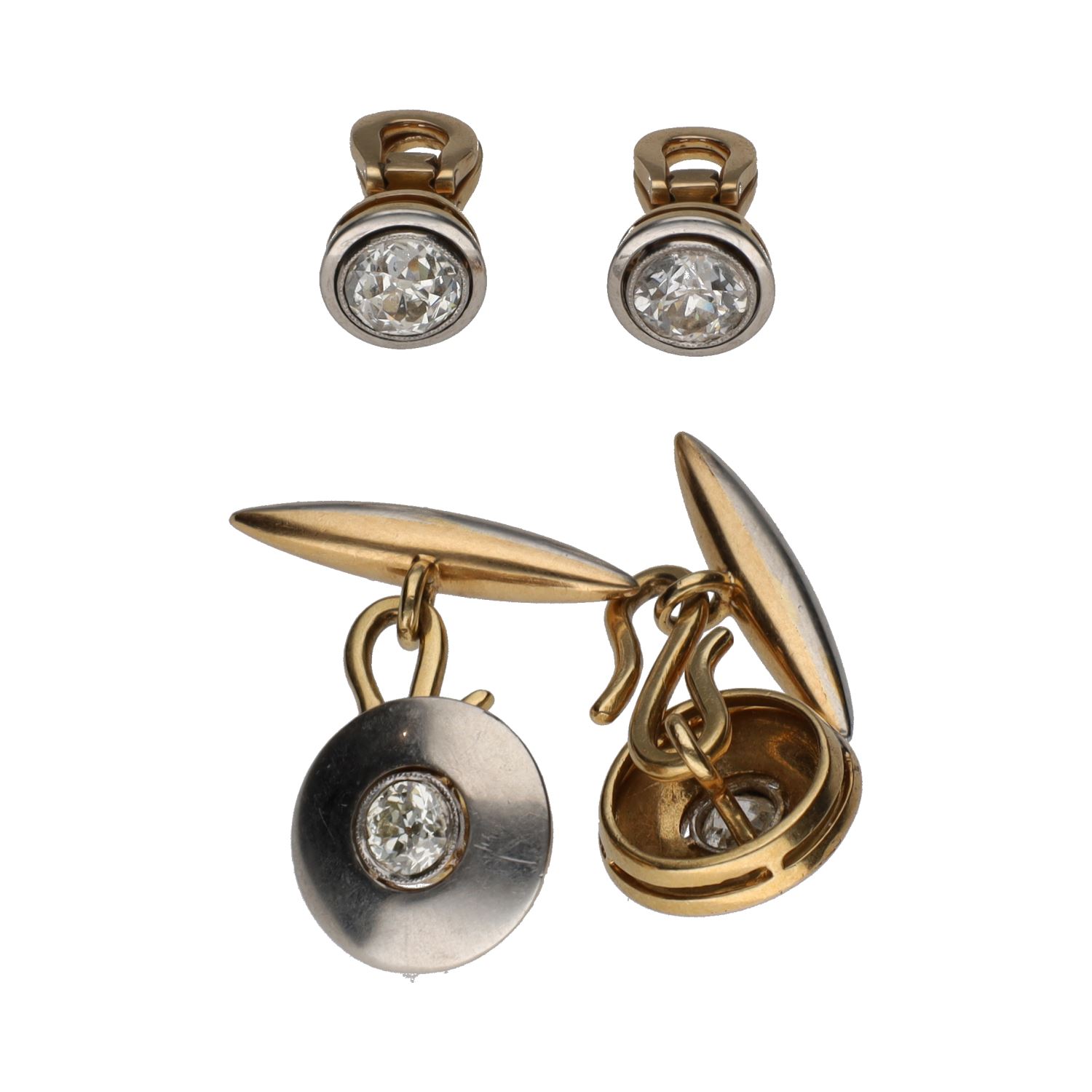 Botonadura en oro blanco y oro amarillo con diamantes.