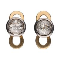 Botonadura en oro blanco y oro amarillo con diamantes.