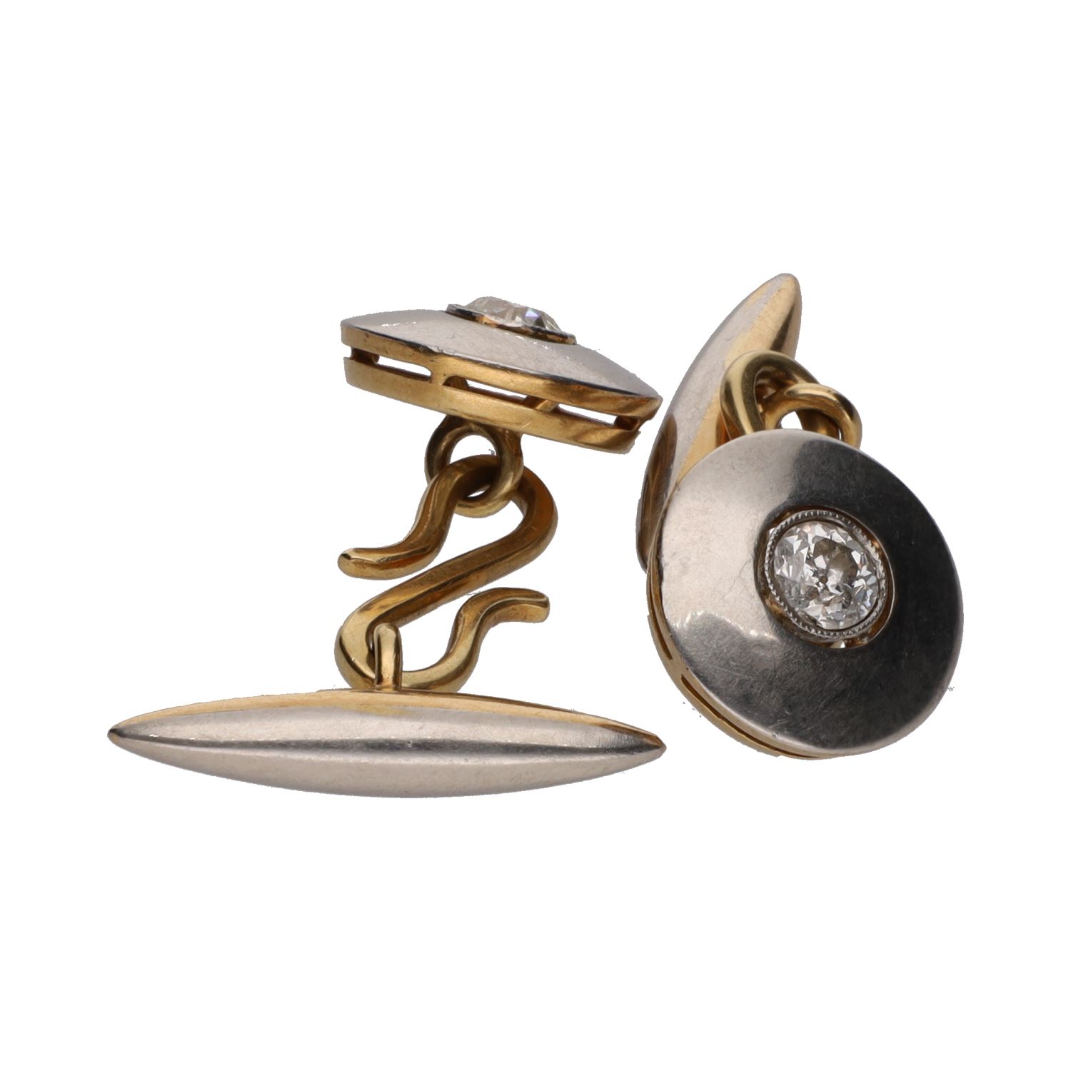 Botonadura en oro blanco y oro amarillo con diamantes.