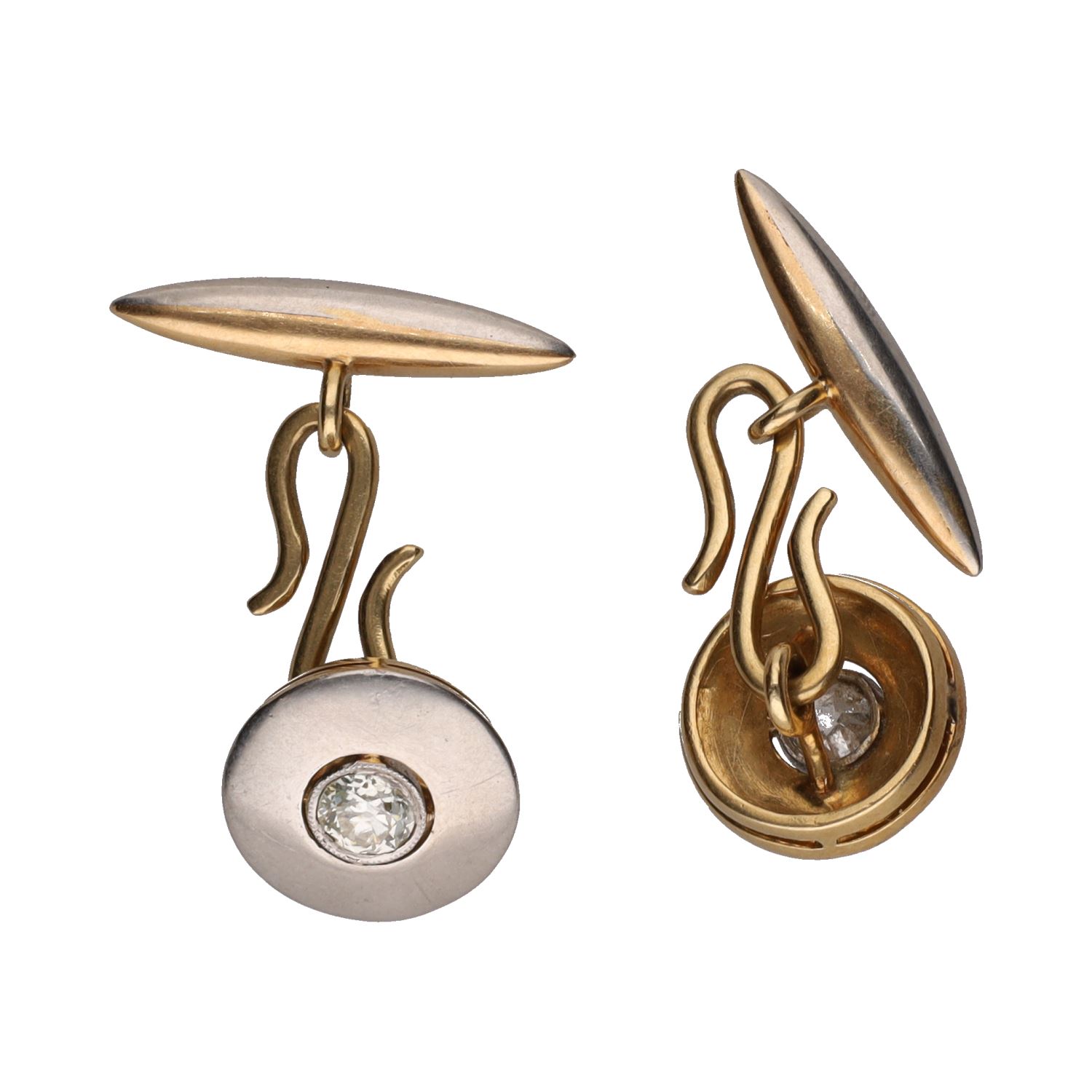 Botonadura en oro blanco y oro amarillo con diamantes.