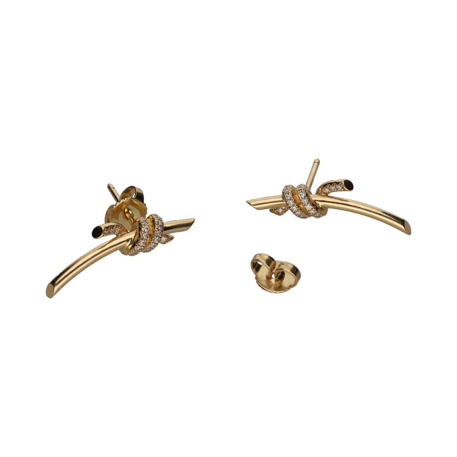 Pendientes tiffany & co en oro amarillo y brillantes.