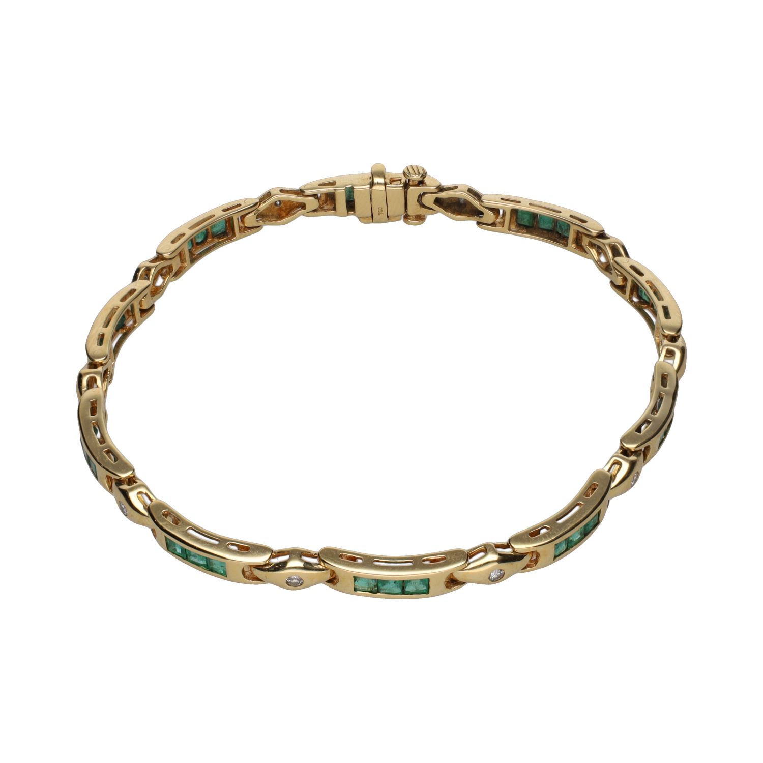 Pulsera en oro amarillo con esmeraldas y brillantes.