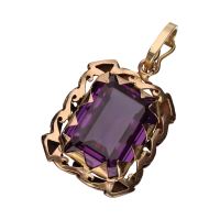 Colgante en oro amarillo con una amatista.
