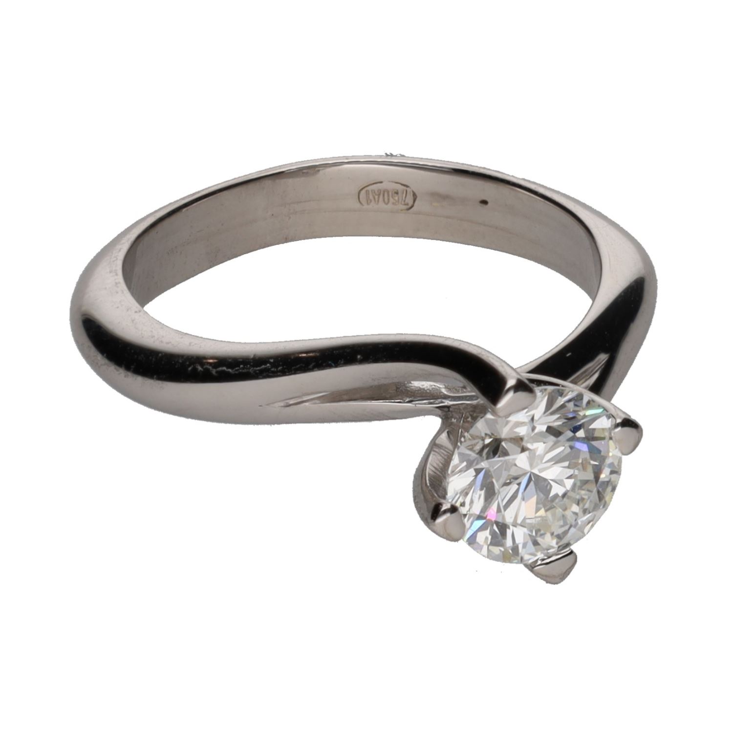 Sortija solitario en oro blanco con un brillante. Talla 13.