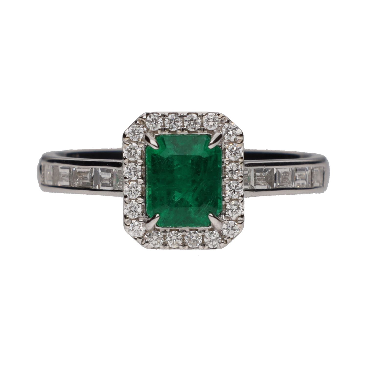 Sortija en oro blanco con esmeralda y brillantes. Talla 14.