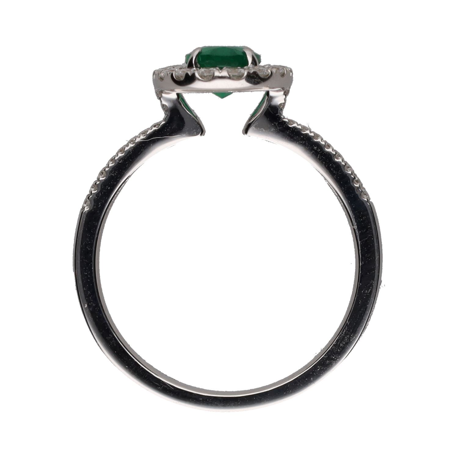 Sortija en oro blanco con esmeralda y orla de brillantes. Talla 14.