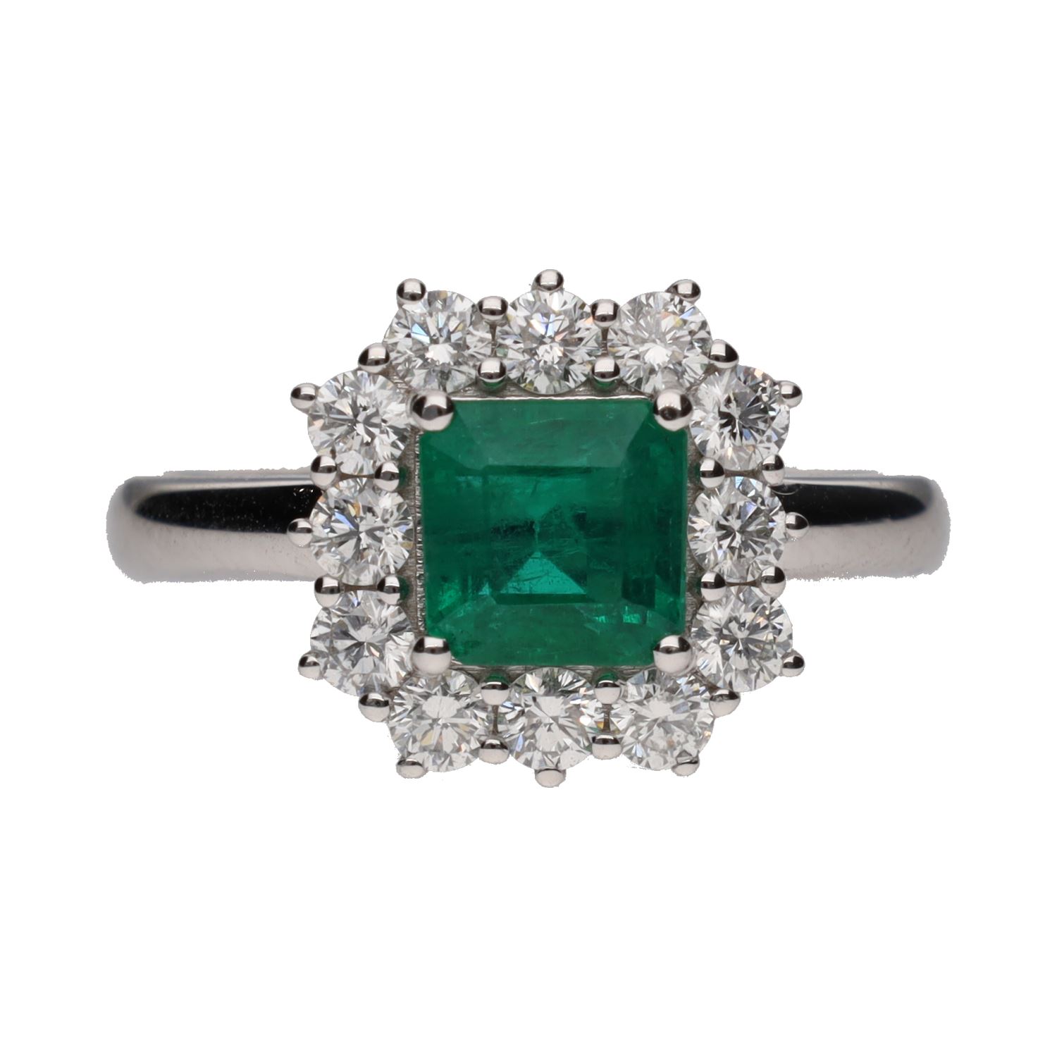 Sortija en oro blanco con esmeralda cuadrada y orla de brillantes . Talla 14.