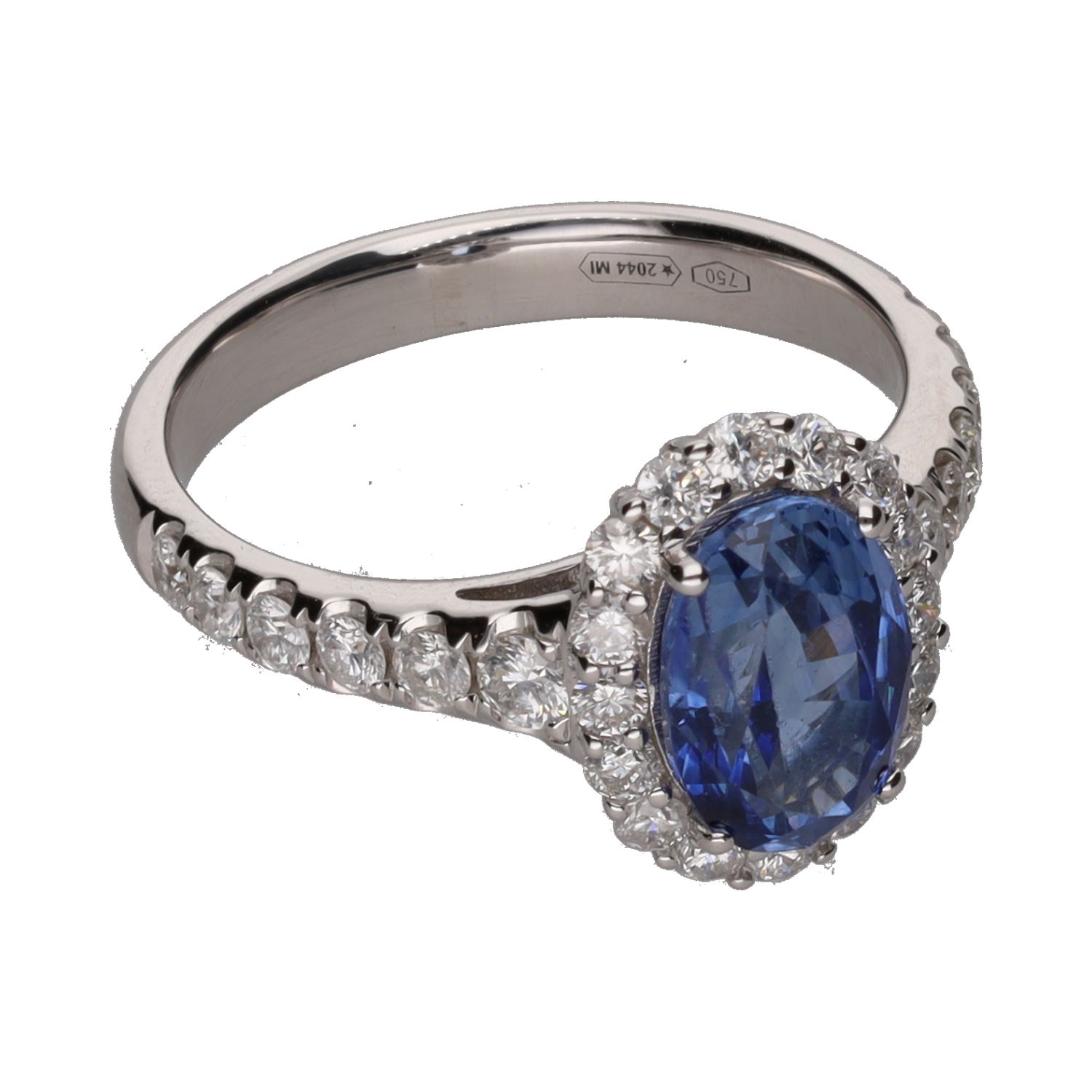 Sortija en oro blanco con un zafiro y brillantes. Talla 14.