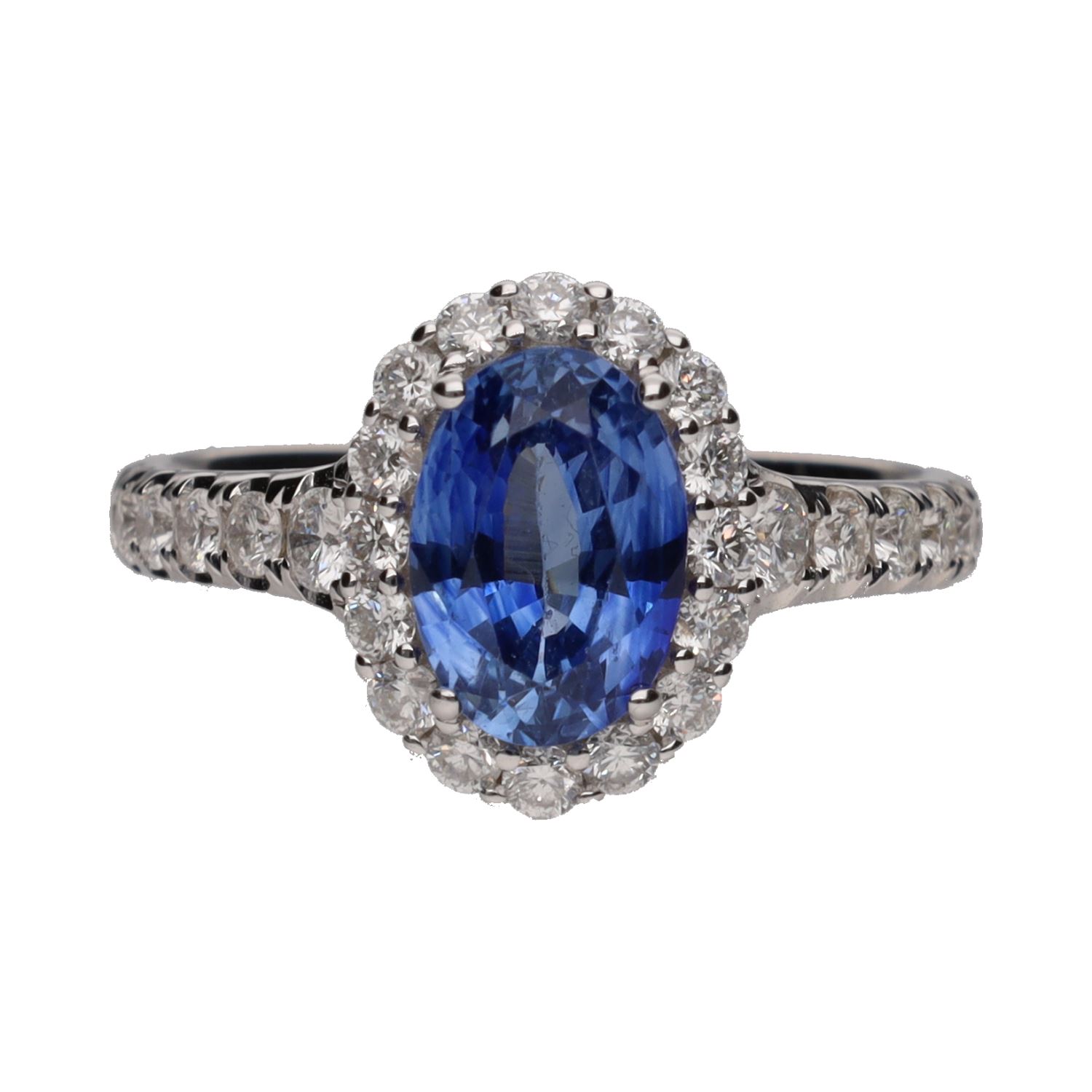 Sortija en oro blanco con un zafiro y brillantes. Talla 14.