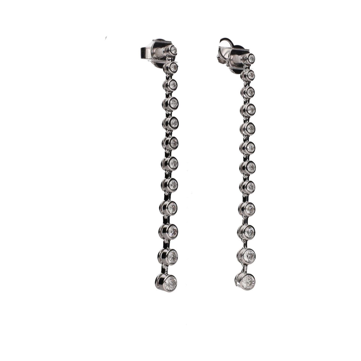 Pendientes en oro blanco con brillantes en chatón.