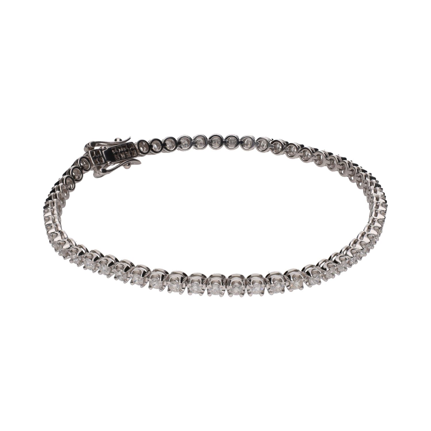 Pulsera riviere en oro blanco con brillantes.