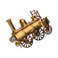 Broche  s-xix en forma de locomotora en oro amarillo con diamantes.