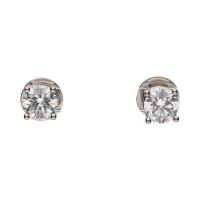 Pendientes dormilonas en oro blanco con brillantes.