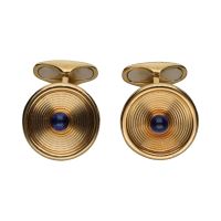 Gemelos firmados por suarez en oro amarillo con zafiros.