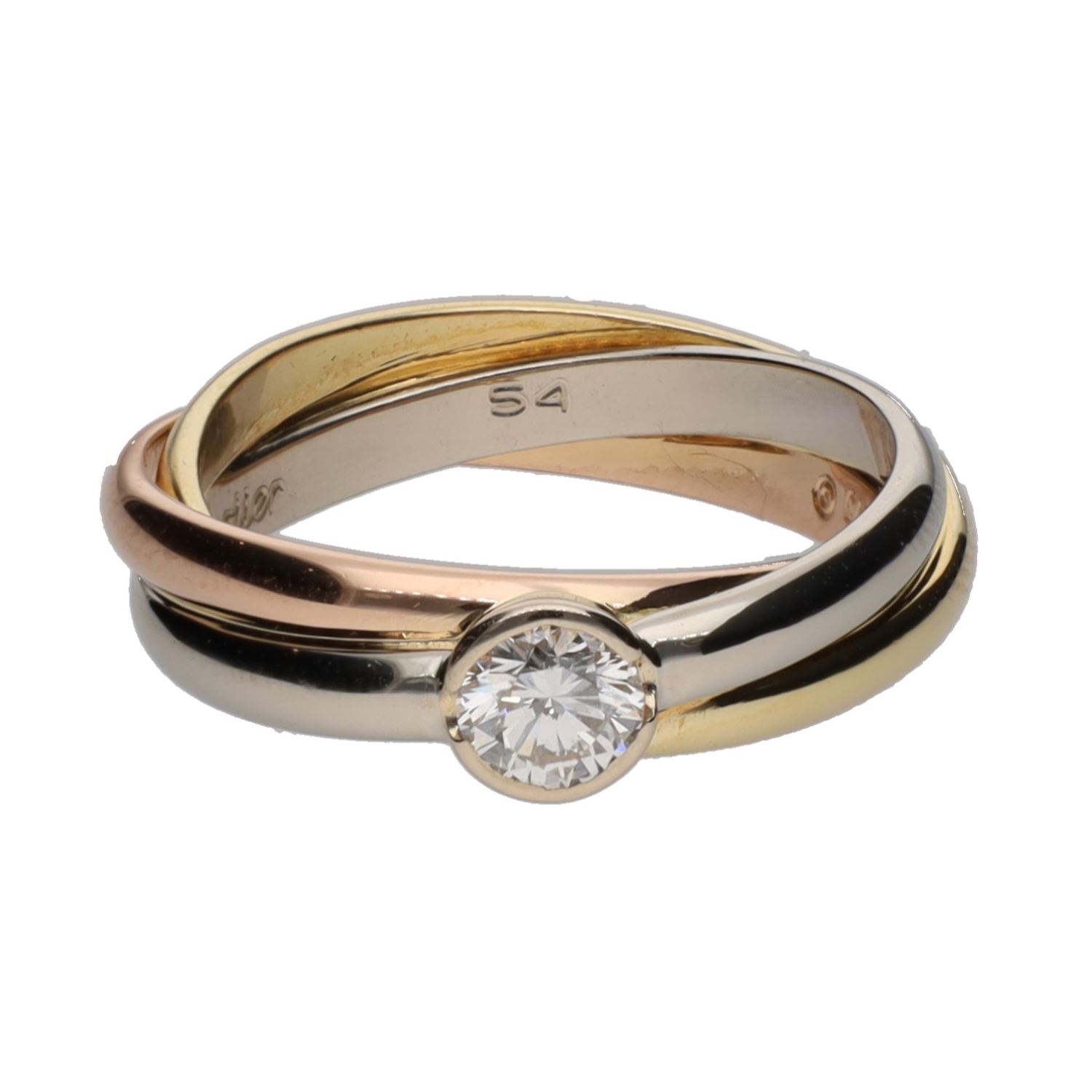 Sortija triana de cartier en tres oros con un brillante. Talla 54