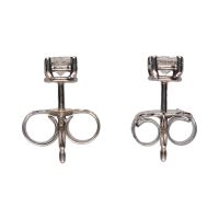 Pendientes en oro blanco con brillantes en garras.