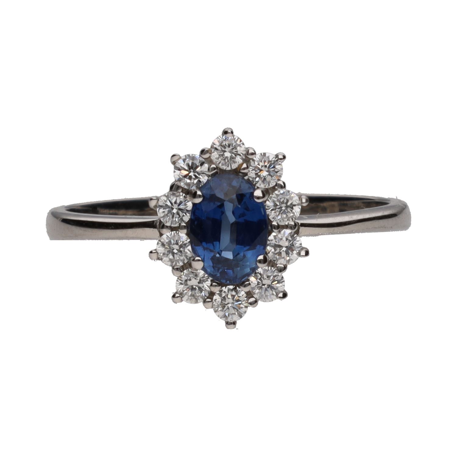 Sortija en oro blanco con zafiro y orla de brillantes. Talla 13.