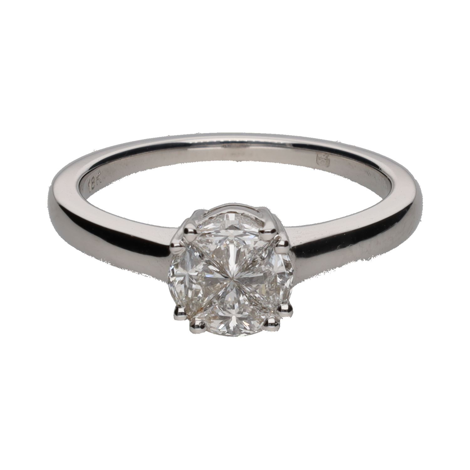 Sortija en oro blanco con cuatro brillantes. Talla 14.