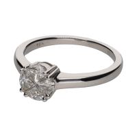 Sortija en oro blanco con cuatro brillantes. Talla 14.