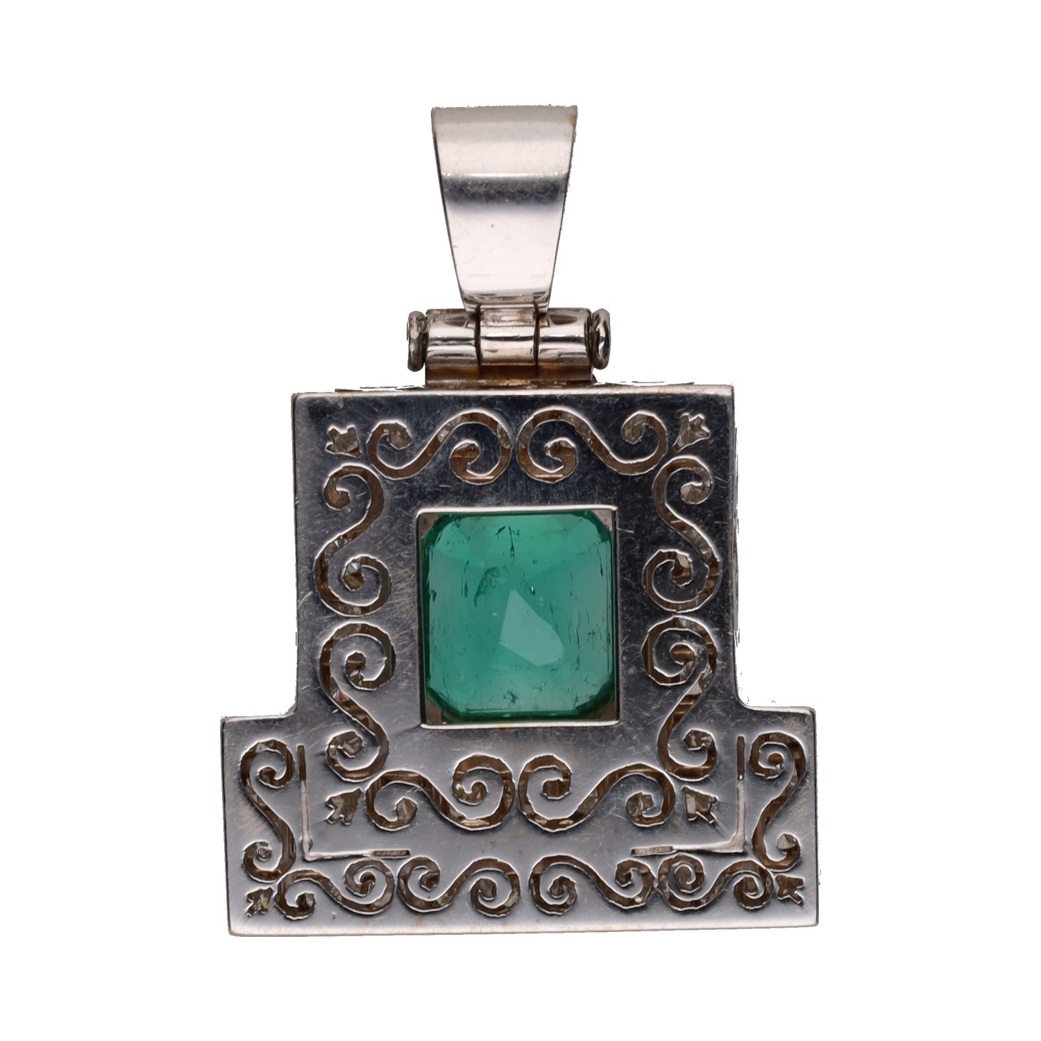 Colgante en oro blanco con esmeralda y brillantes.
