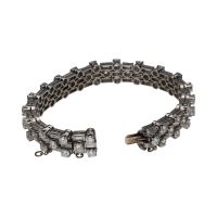 Pulsera en oro blanco con baguettes y brillantes.